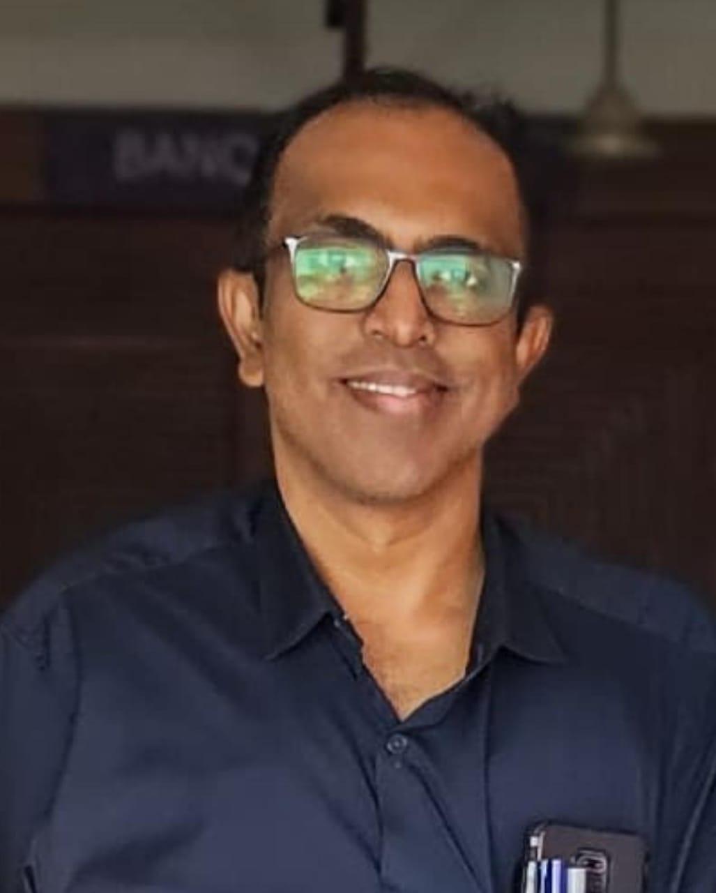 Dr. Manjit George